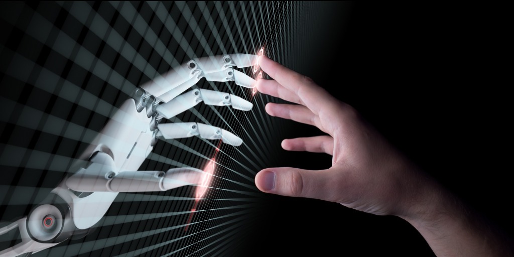 La mano de un robot y la de un humano se tocan en lo que parece una red tecnológica